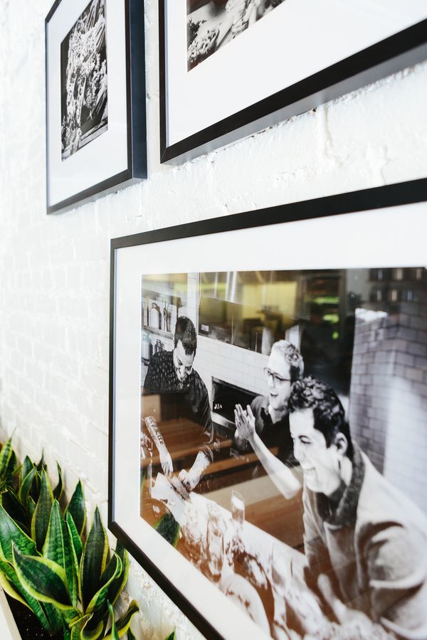 gallery wall at cava restaurant